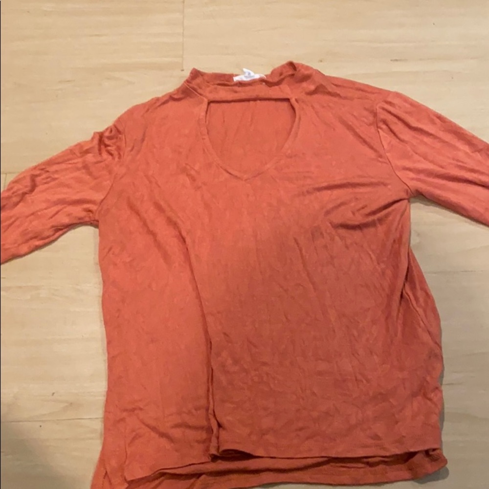 Orange band neck shirt